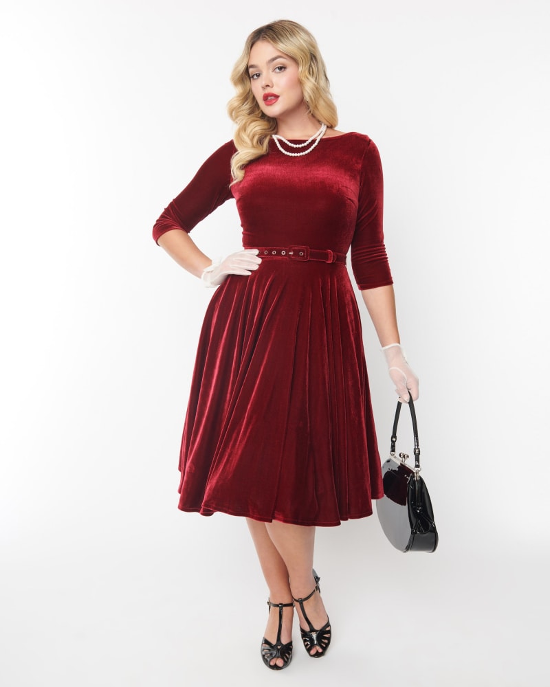 Front of a model wearing a size L Unique Vintage Burgundy Velvet Devon Swing Dress in Burgundy Velvet by Unique Vintage. | dia_product_style_image_id:320732